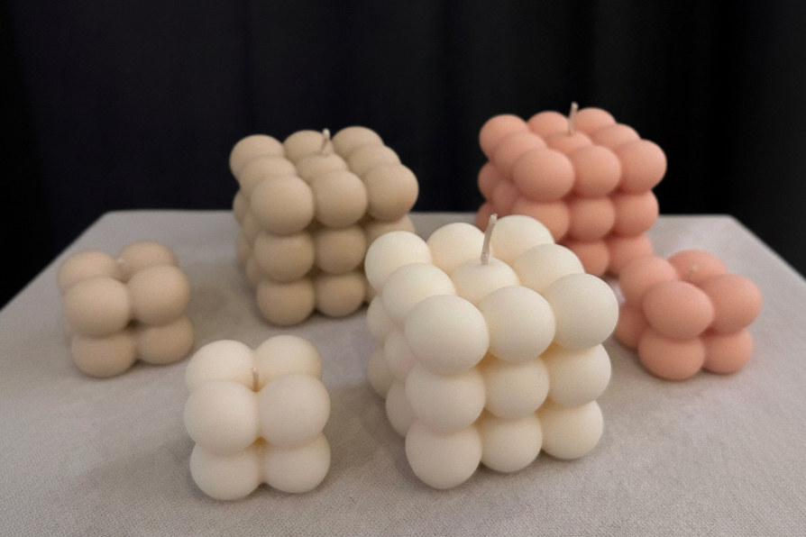 Bubble candles with original tablecloth on black backdrop